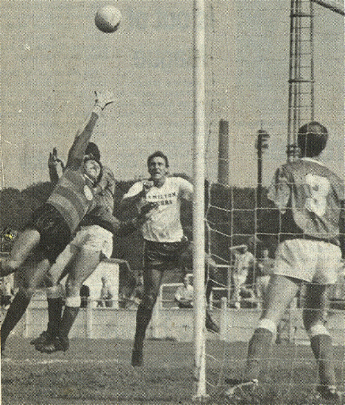 Canterbury keeper Dave Huddart misses a cross and Neil Cugley rises before heading home his first goal.