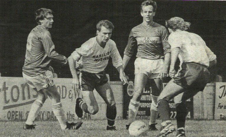 Gary Miller on the run with Ricky Fusco in close attendance.