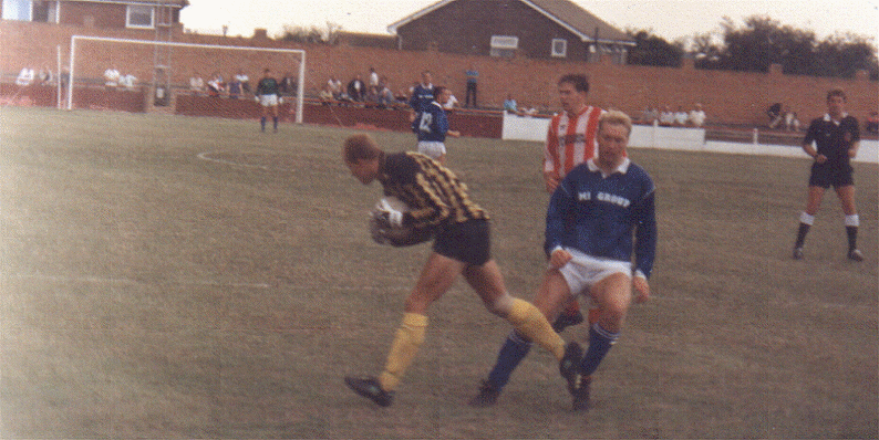Ramsgate keeper Bobby Miles beats Paul Underwood to the ball.