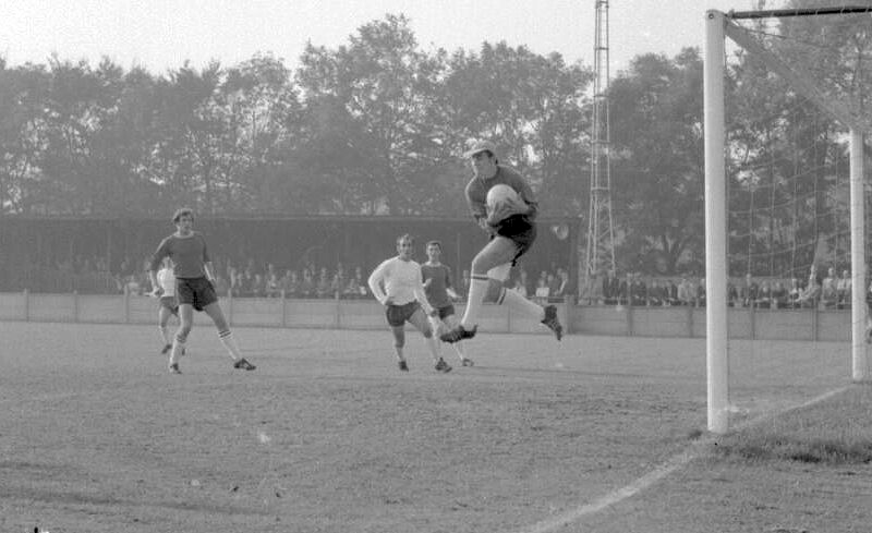 The Hereford keeper makes a catch as Johnny Ray looks on.