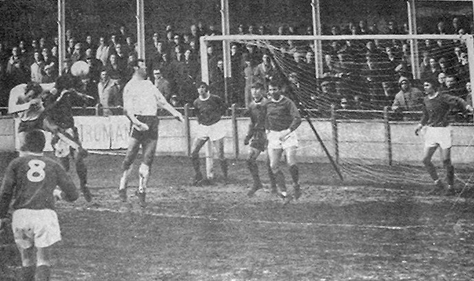 Johnny Ray (left) challenges in the air, Jack Smith is the other Margate player.