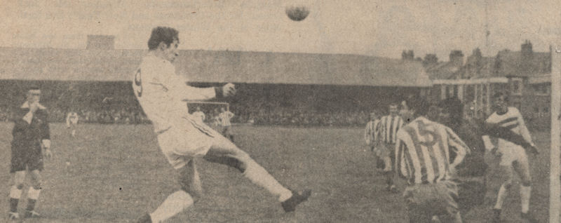 Northampton's number nine Bob Hatton heads at goal, Bob Harrop is Margate's number five and the keeper is Brian Ede.