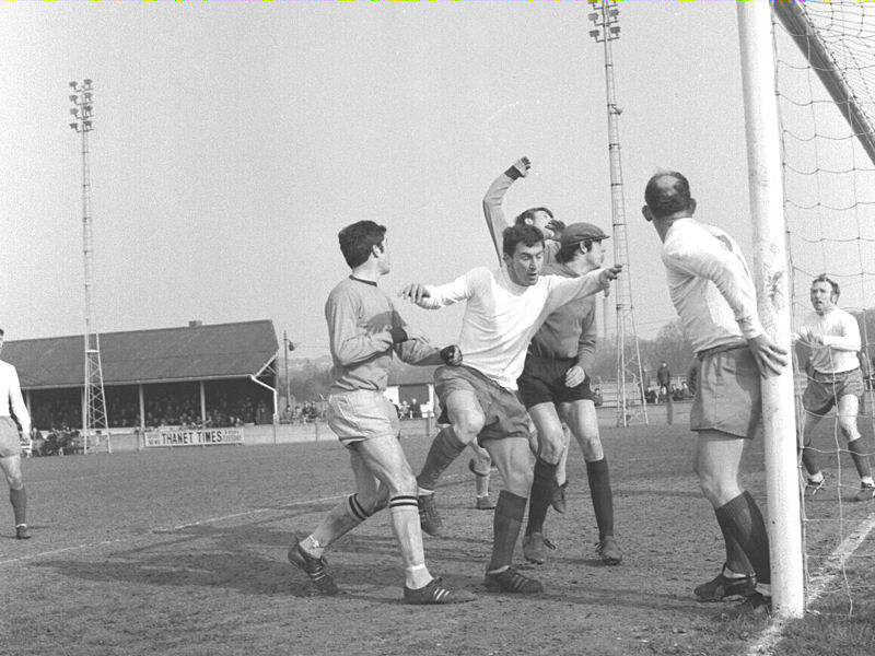 More penalty area action featuring Derek Grace (centre), keeper Brian Ede, Tommy Marshall (near post) and Don Campbell (far post).