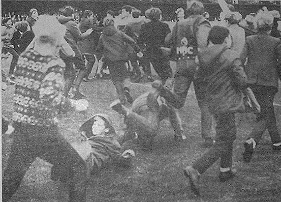 A pitch invasion at the final whistle.