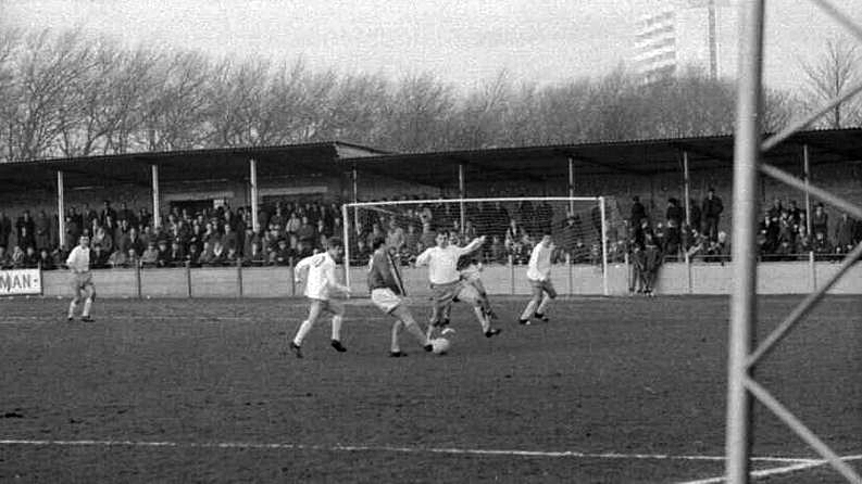 Tommy Jenkins watches a battle for the ball.