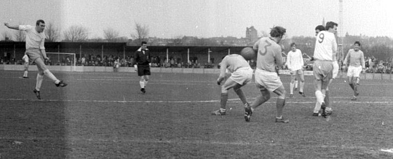 A typically venemous drive from Bryan Clifton prompts evasive action all round.