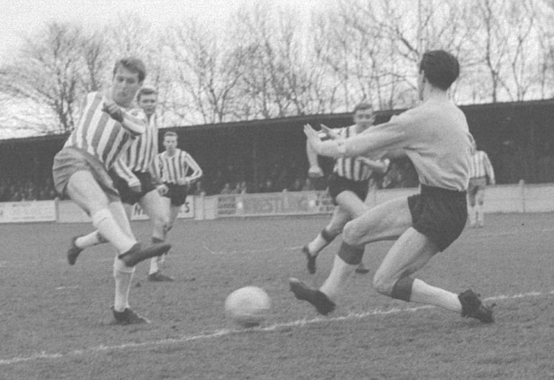 Dennis Randall strikes for goal.